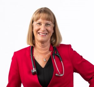 Denise Waye in red blazer